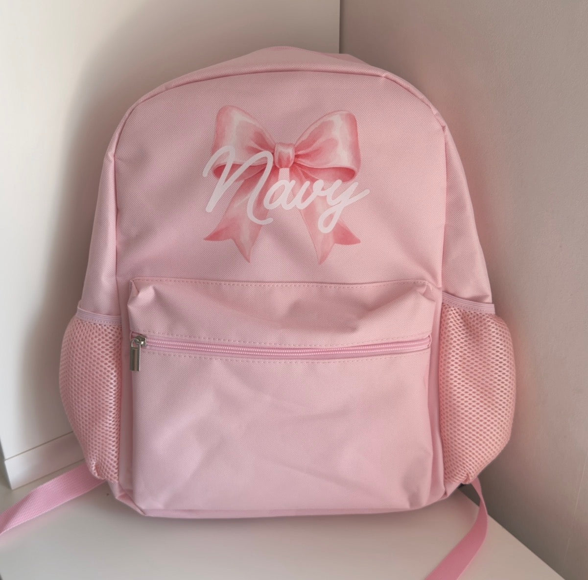 Pink bow backpack