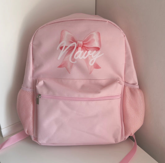 Pink bow backpack